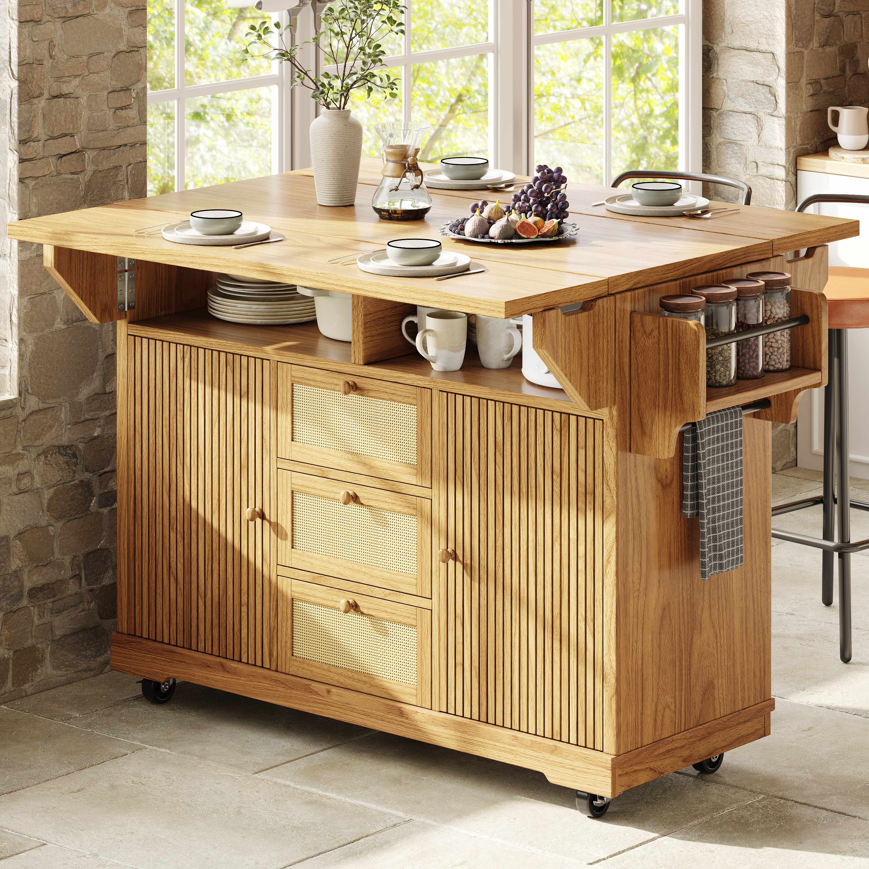 Îlot de cuisine avec rangement, plan de travail extensible 142,5 cm, hauteur 95 cm, tiroirs en rotin PE, roulettes, bois naturel