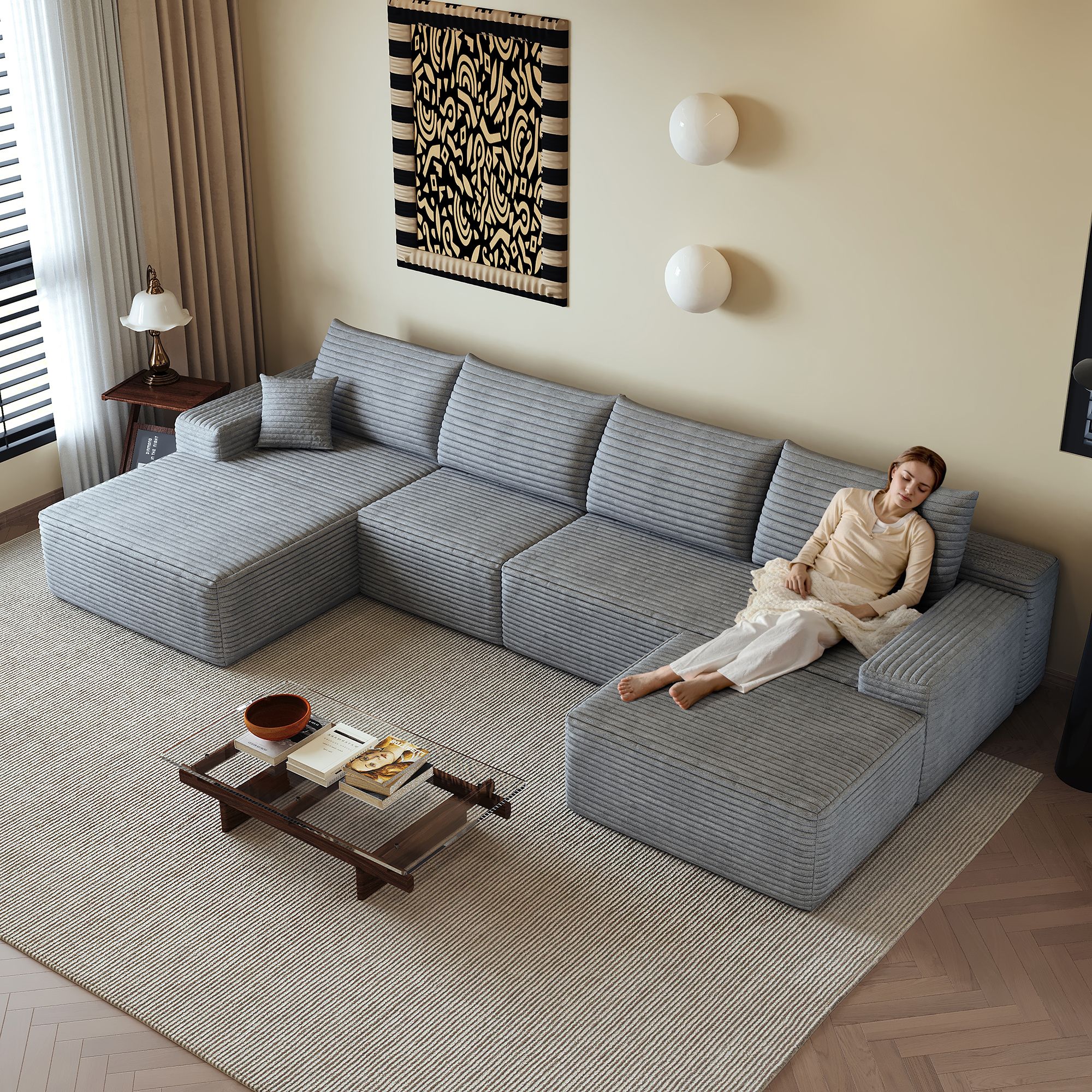 Canapé d'angle gris en tissu côtelé, structure modulaire sans montage, profondeur de siège généreuse, dimensions 340x175x83 cm pour salon