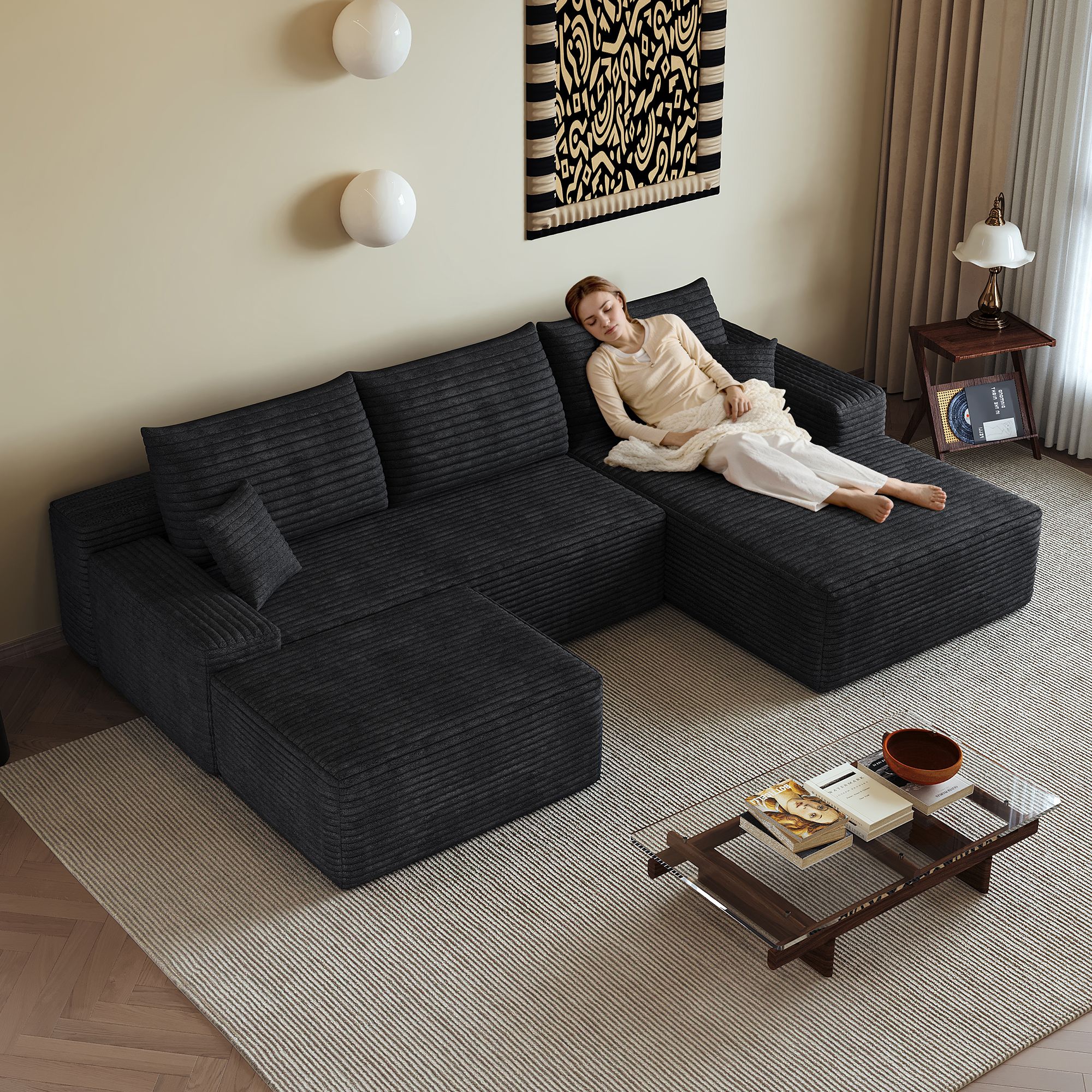Canapé d'angle en velours côtelé noir, dimensions 270x175x83cm, design contemporain avec lignes fluides et assise large