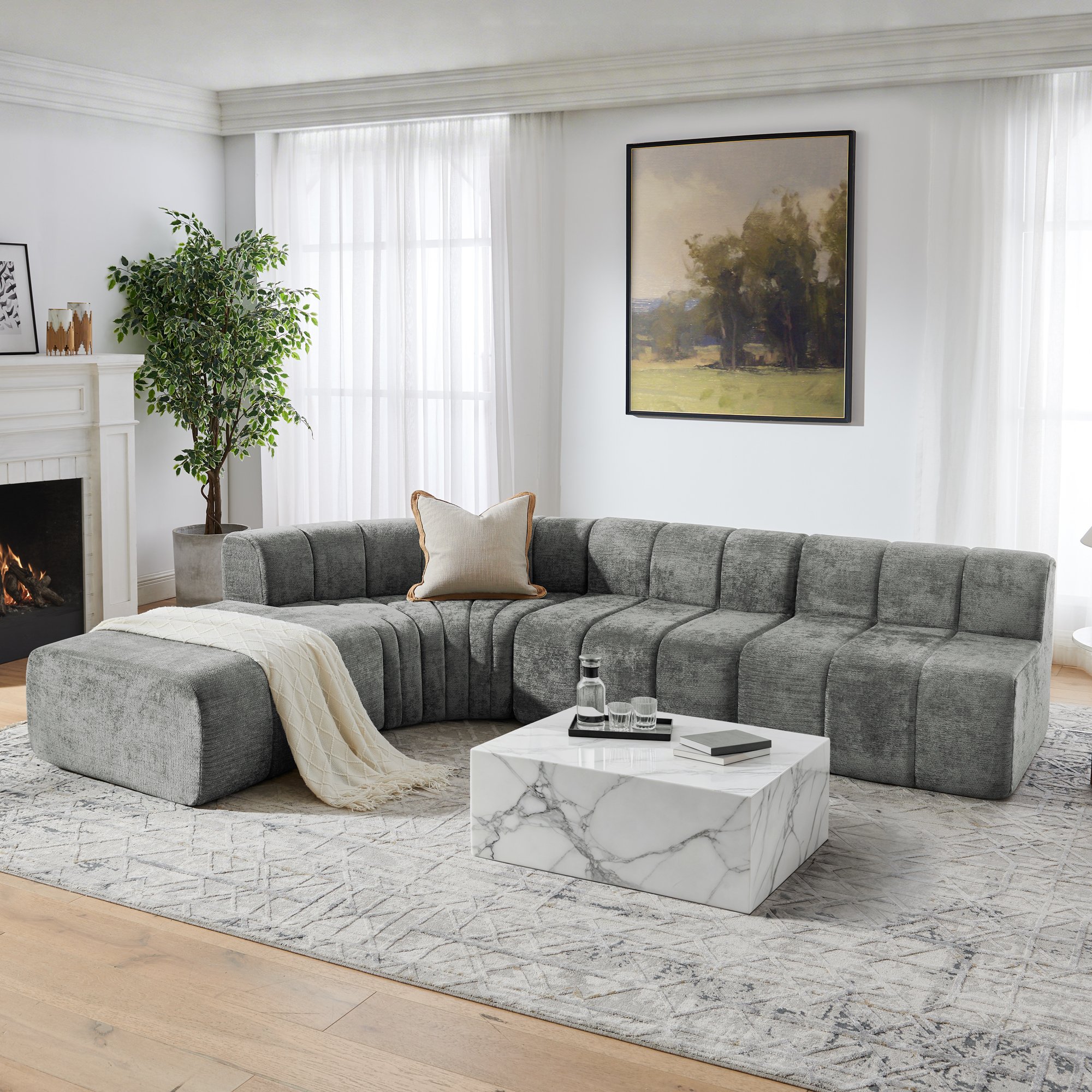 Canapé d'angle modulable 4 places en chenille gris, structure sans outils, coussins multifonctions et mousse haute résilience pour un confort optimal au quotidien.