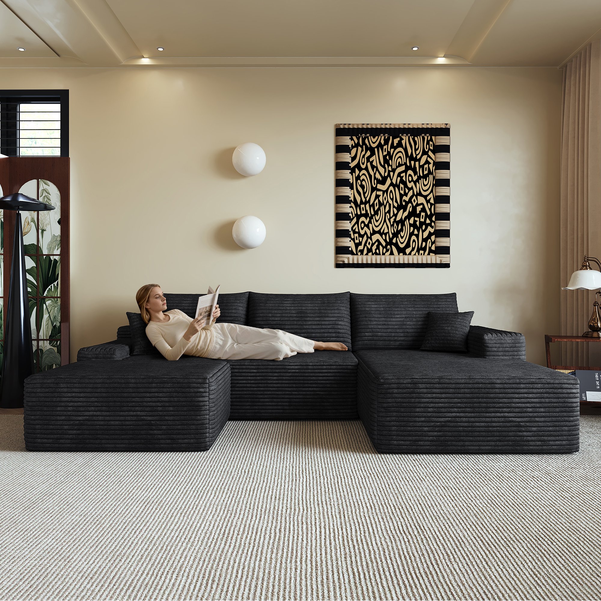 Canapé d'angle en velours côtelé noir, dimensions 270x175x83cm, design contemporain avec lignes fluides et assise large