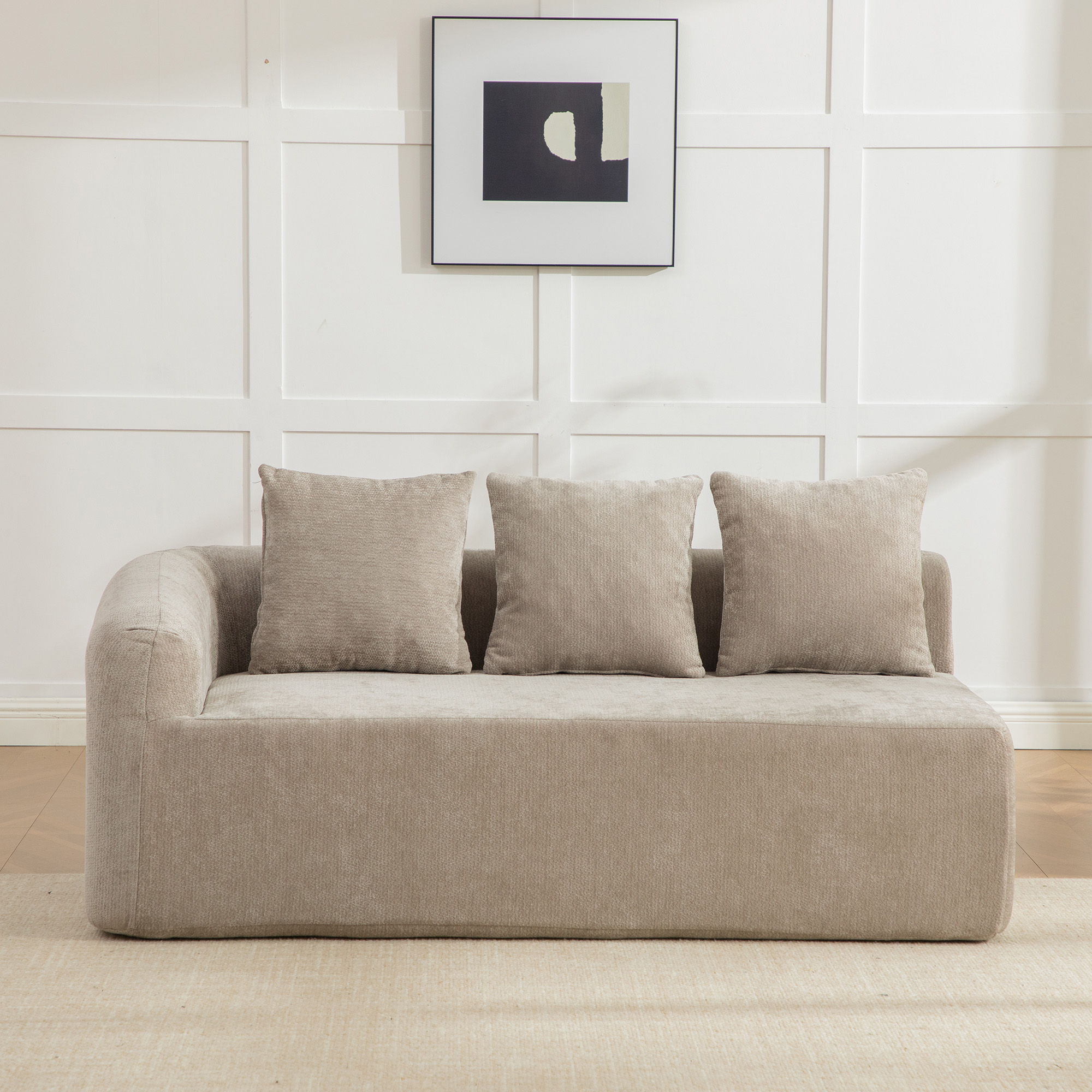 Canapé modulable en tissu Chenille gris, design contemporain pour salon, confort moelleux et structure stable.
