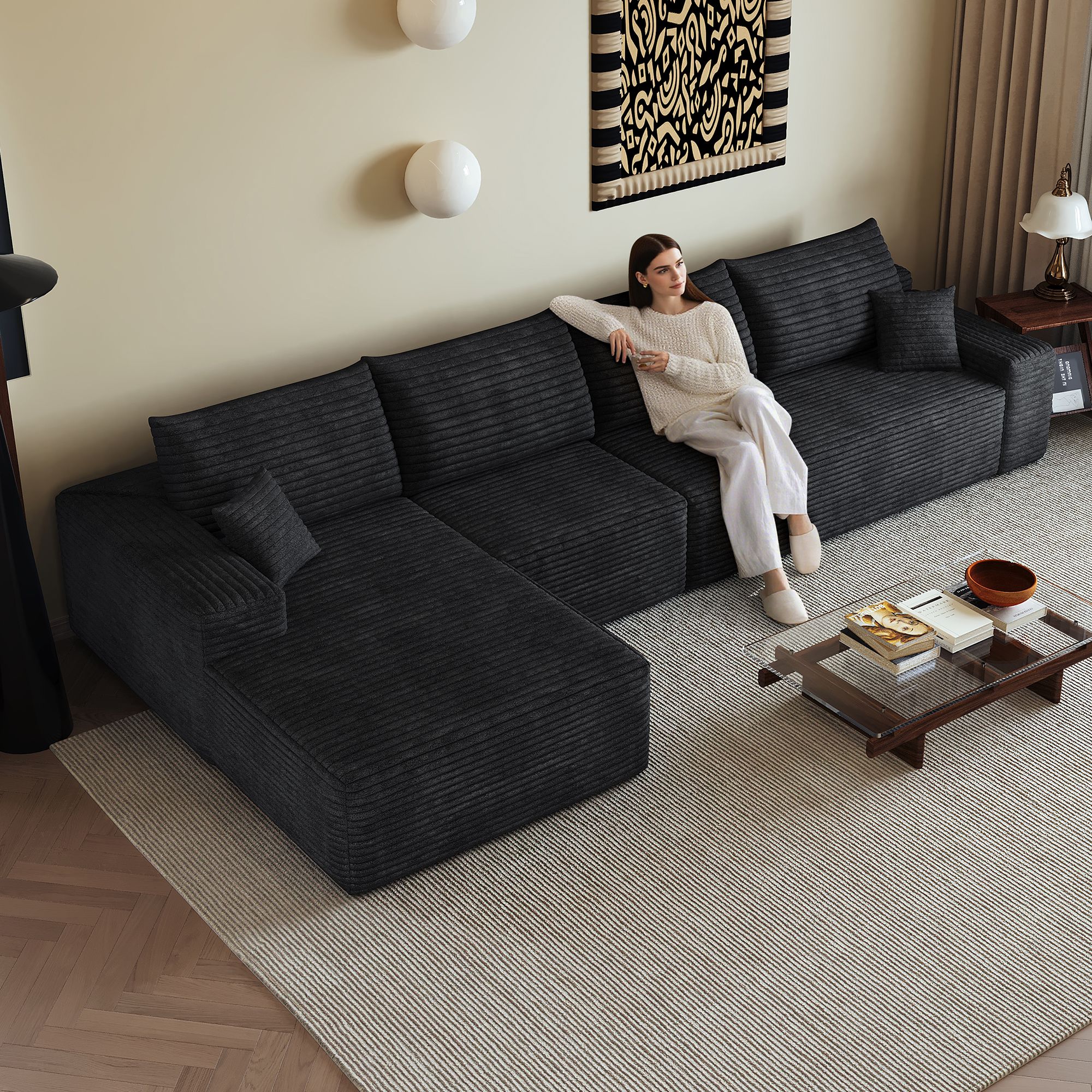 Canapé d'angle 340x175cm en tissu velours côtelé noir, structure modulaire avec méridienne, assise profonde, sans montage requis