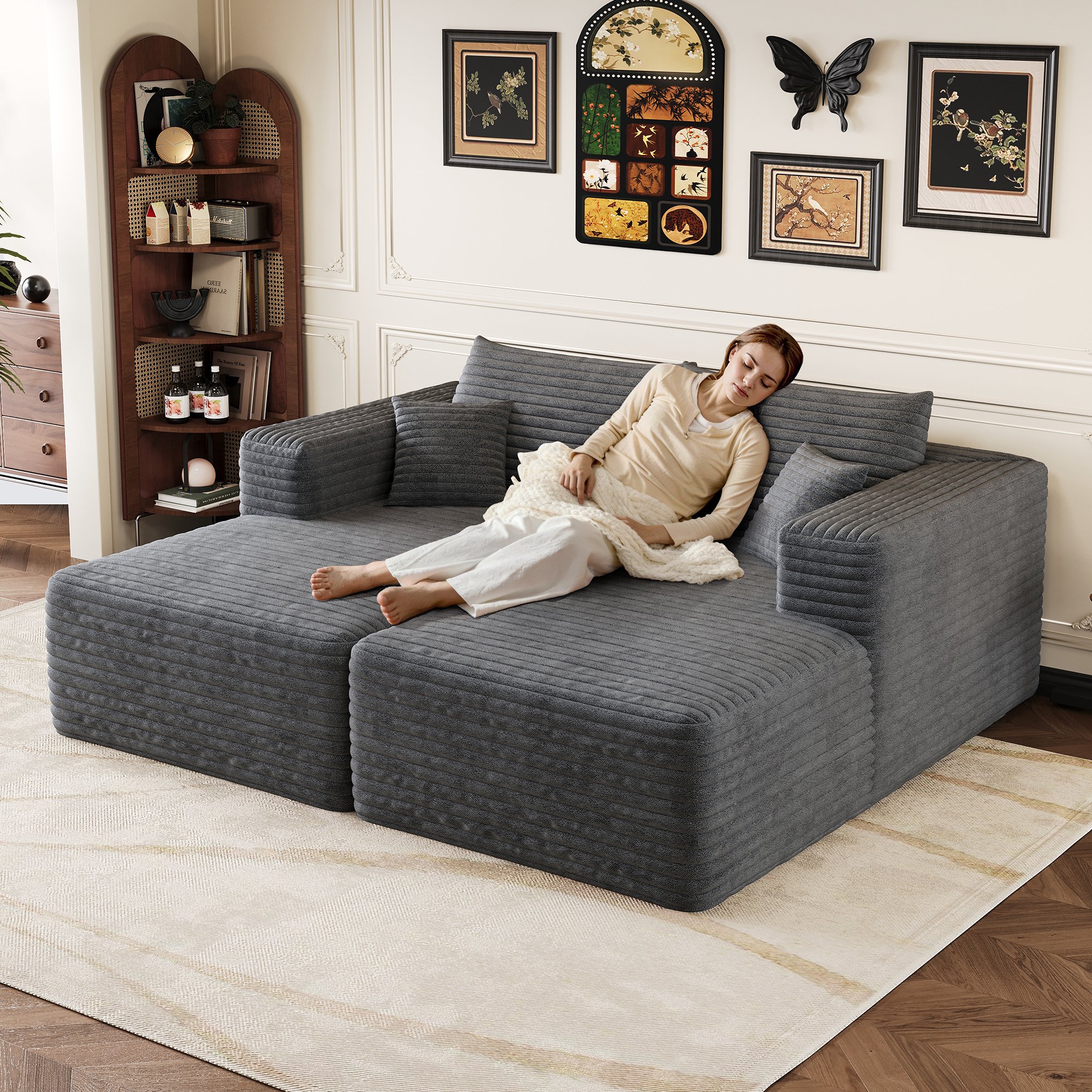 Canapé d'angle en tissu velours côtelé gris anthracite, design minimaliste sans pieds visibles, assise profonde et moelleuse