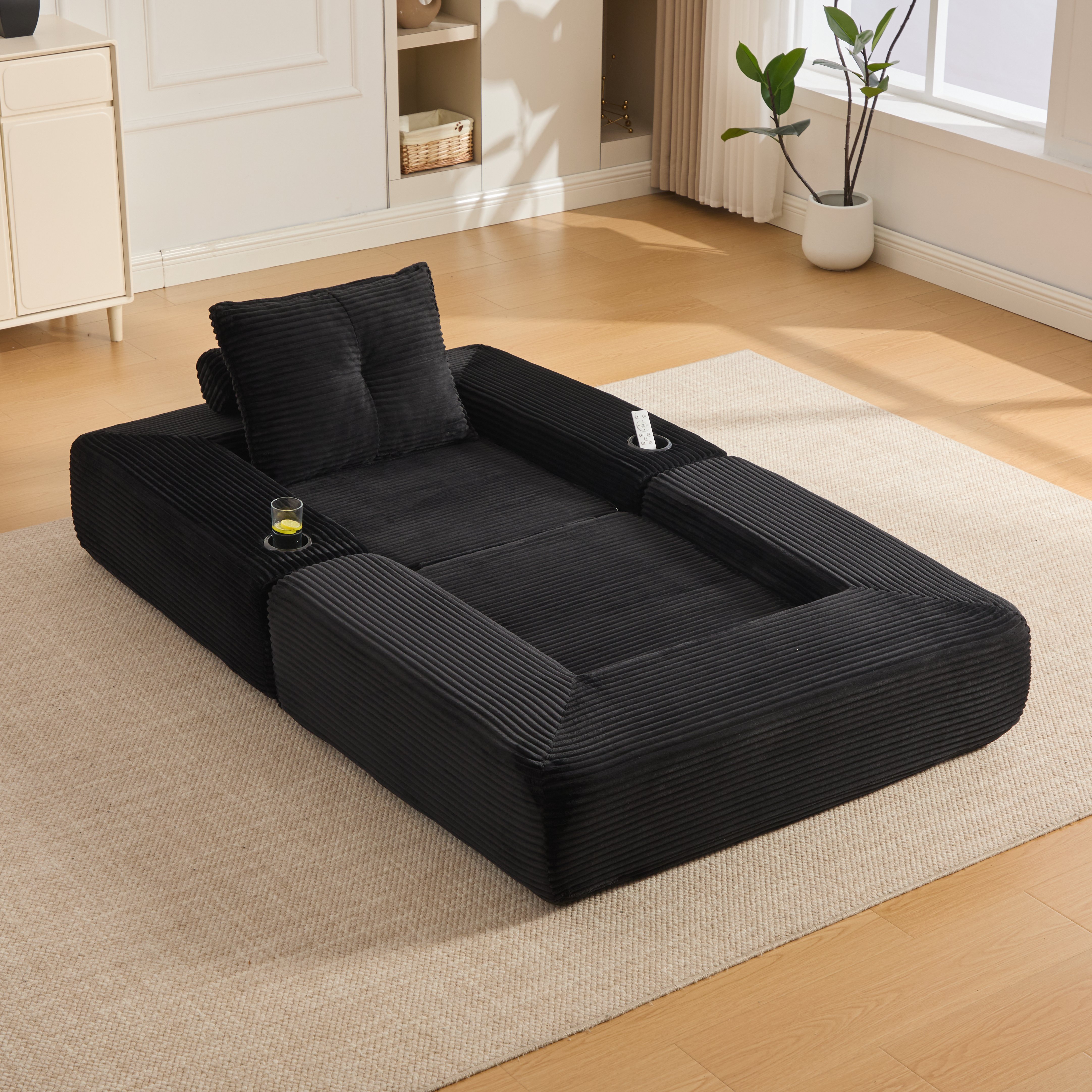 Canapé convertible compact en velours côtelé noir avec coussins à mémoire de forme et porte-gobelet