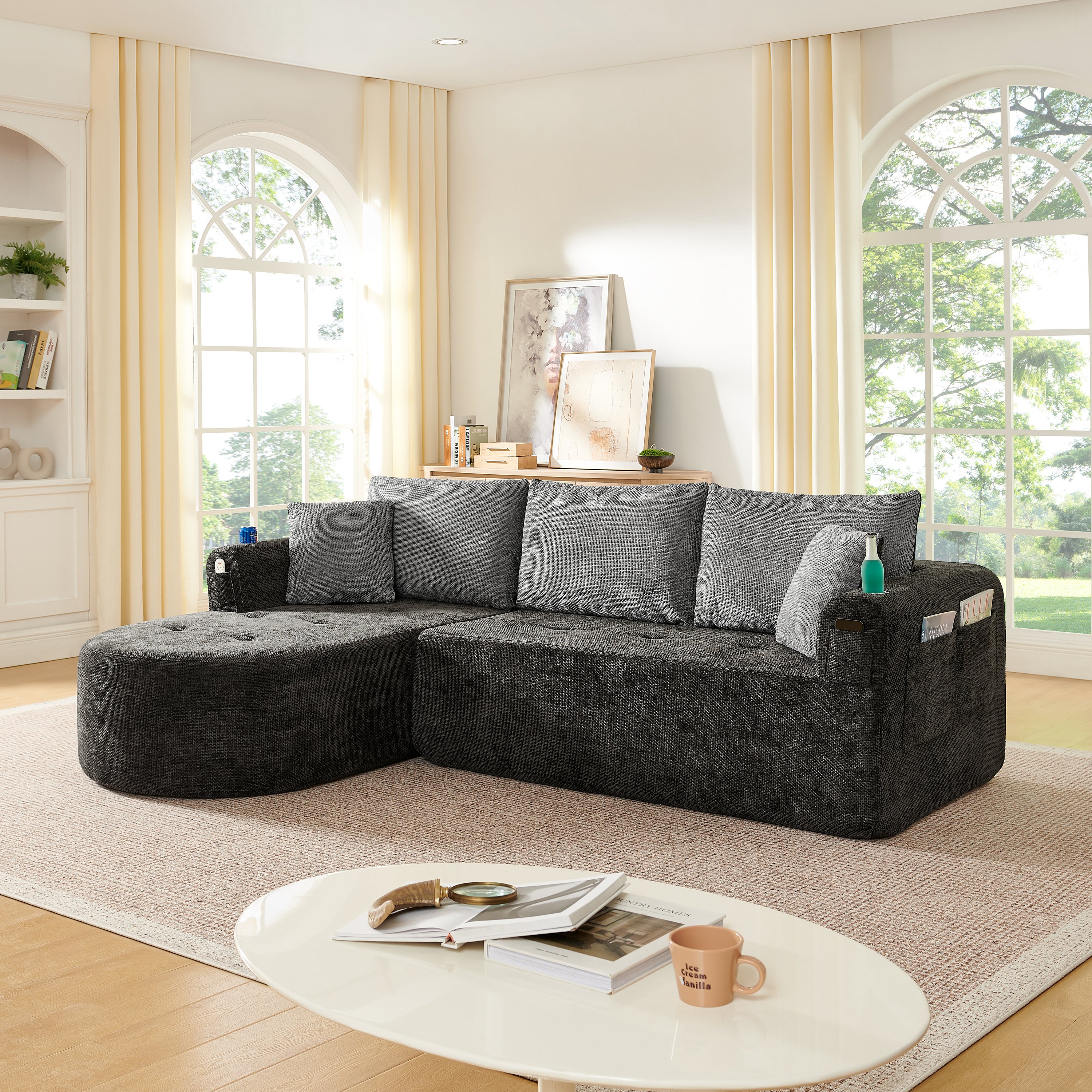 Canapé d'angle modulable noir en tissu Lin, design contemporain avec porte-gobelet inox et pochettes de rangement intégrées