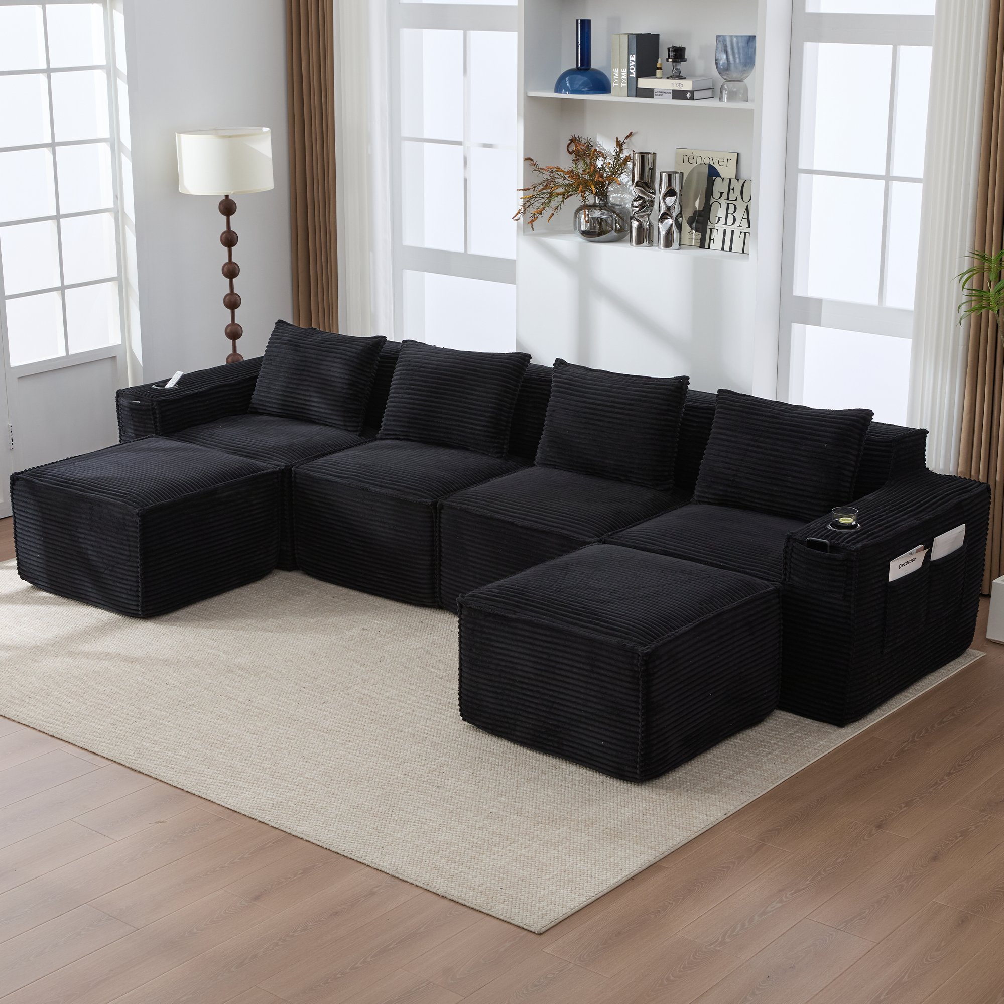 Canapé Modulable Noir Corduroy 4 Places avec 2 Poufs, Porte-Gobelets et Poches de Rangement, Mousse Haute Densité et Ressorts pour Salon ou Appartement Compact