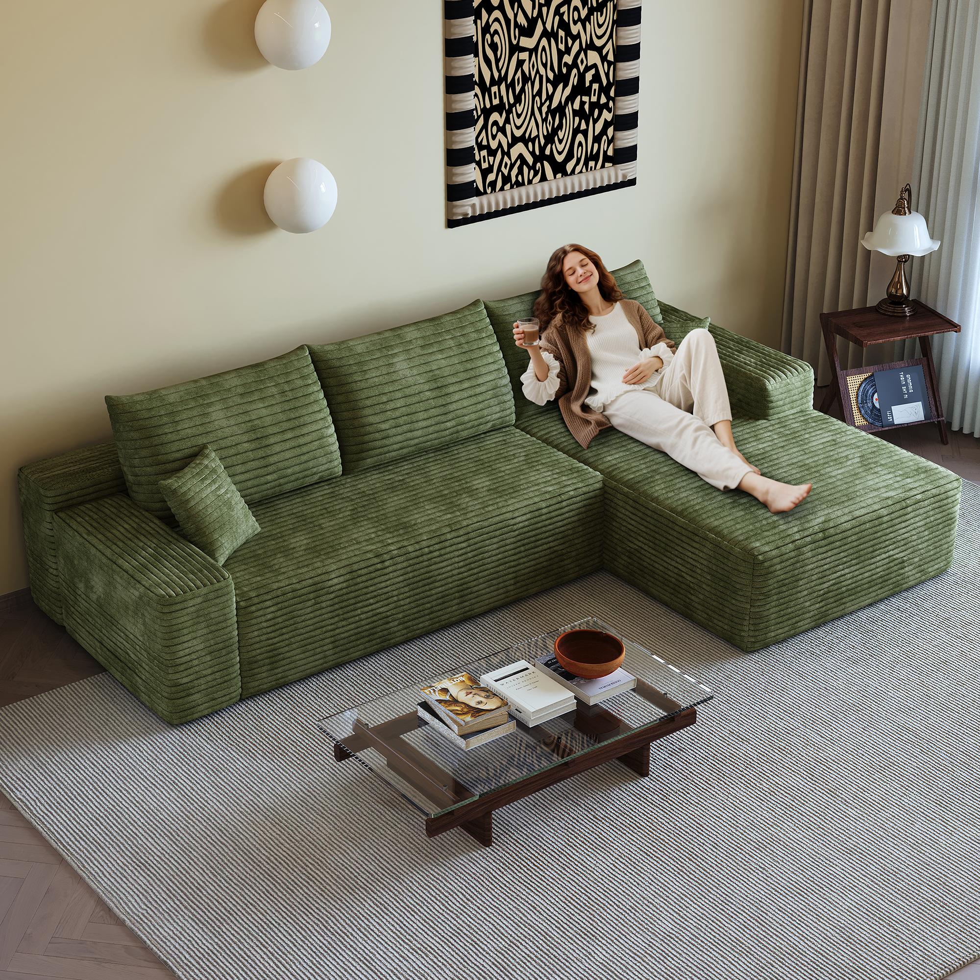 Canapé d'angle en tissu velours côtelé vert, structure boneless, assise profonde, dimensions 270x175x83cm, design moderne épuré