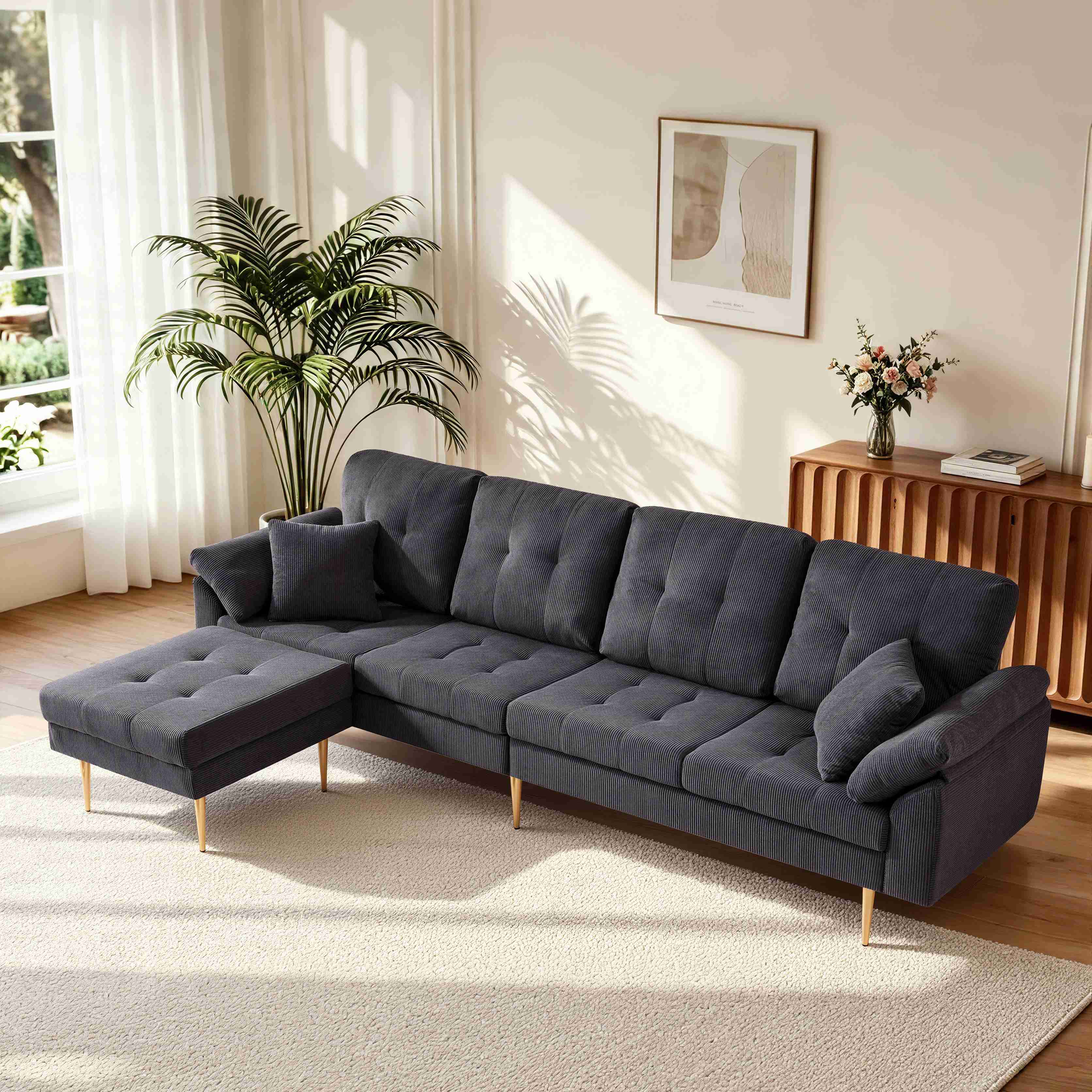 Canapé 4 places en velours côtelé gris foncé avec pouf amovible, structure métallique et pieds hauts de 20 cm pour un style moderne et épuré dans votre salon.