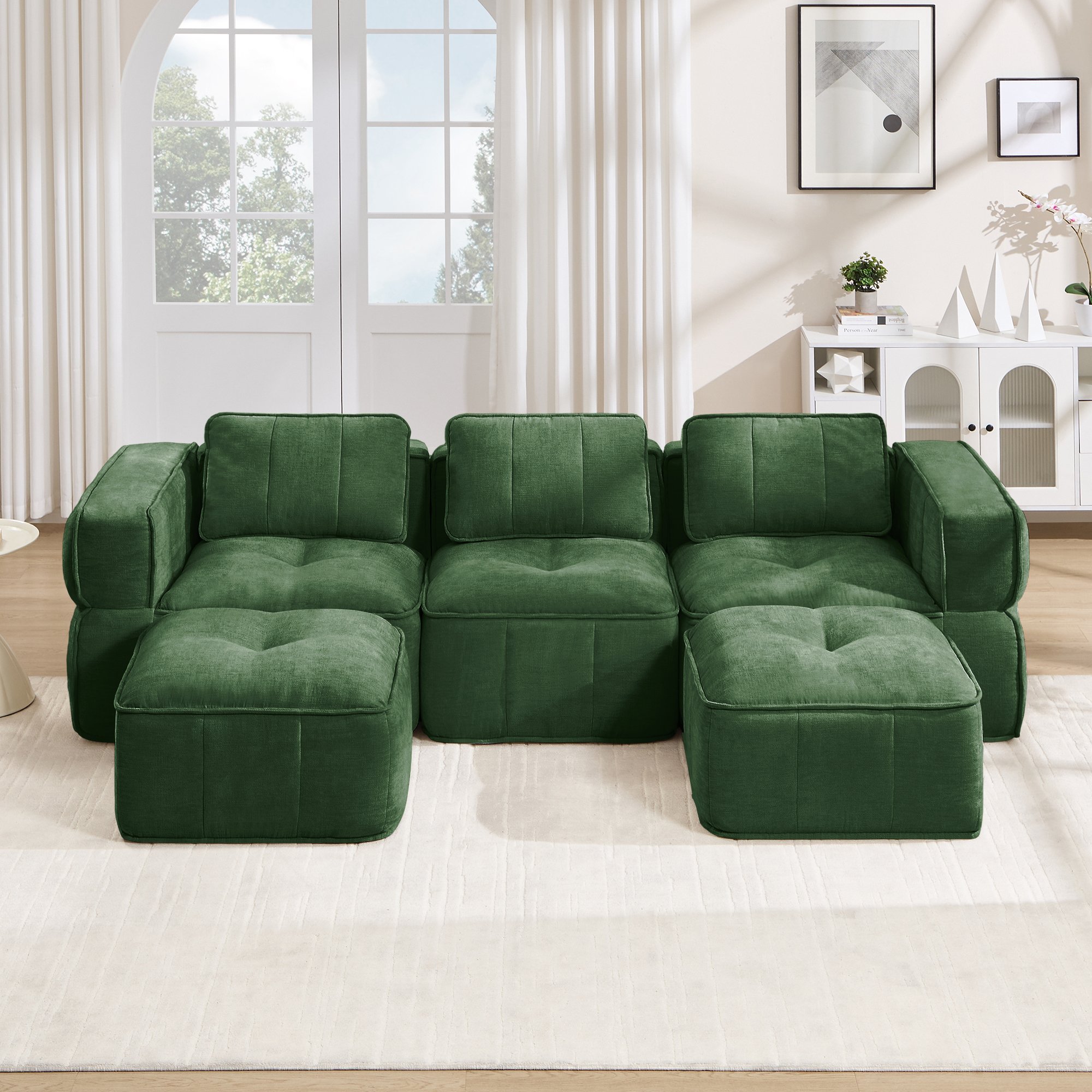 Canapé modulable 3 places vert en polyester, structure sans cadre, mousse haute densité, profondeur assise généreuse, idéal pour le salon moderne et les moments de détente.