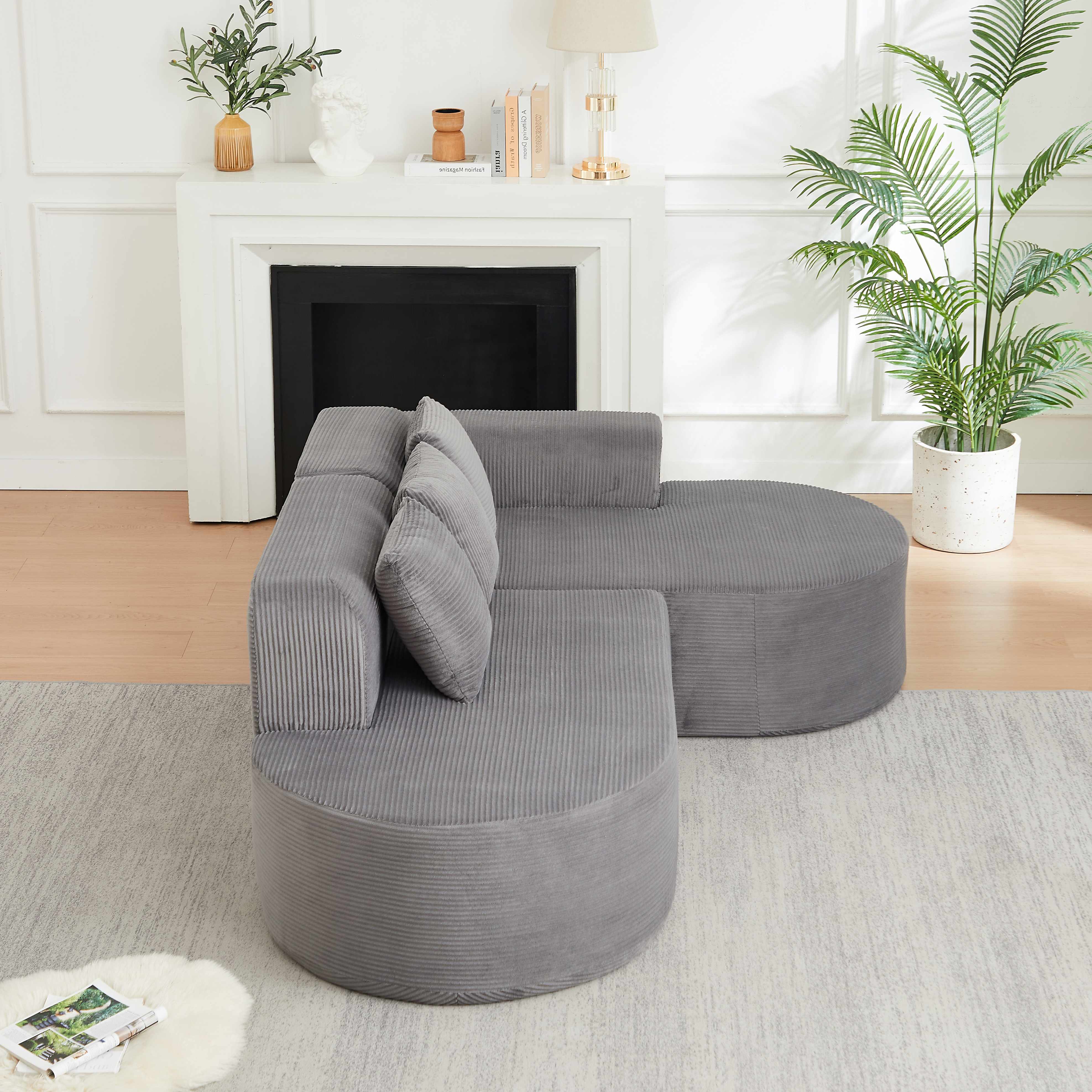 Canapé d'angle 220x155cm en velours côtelé gris, design courbe avec coussins inclus, structure mousse et ressorts pour salon moderne
