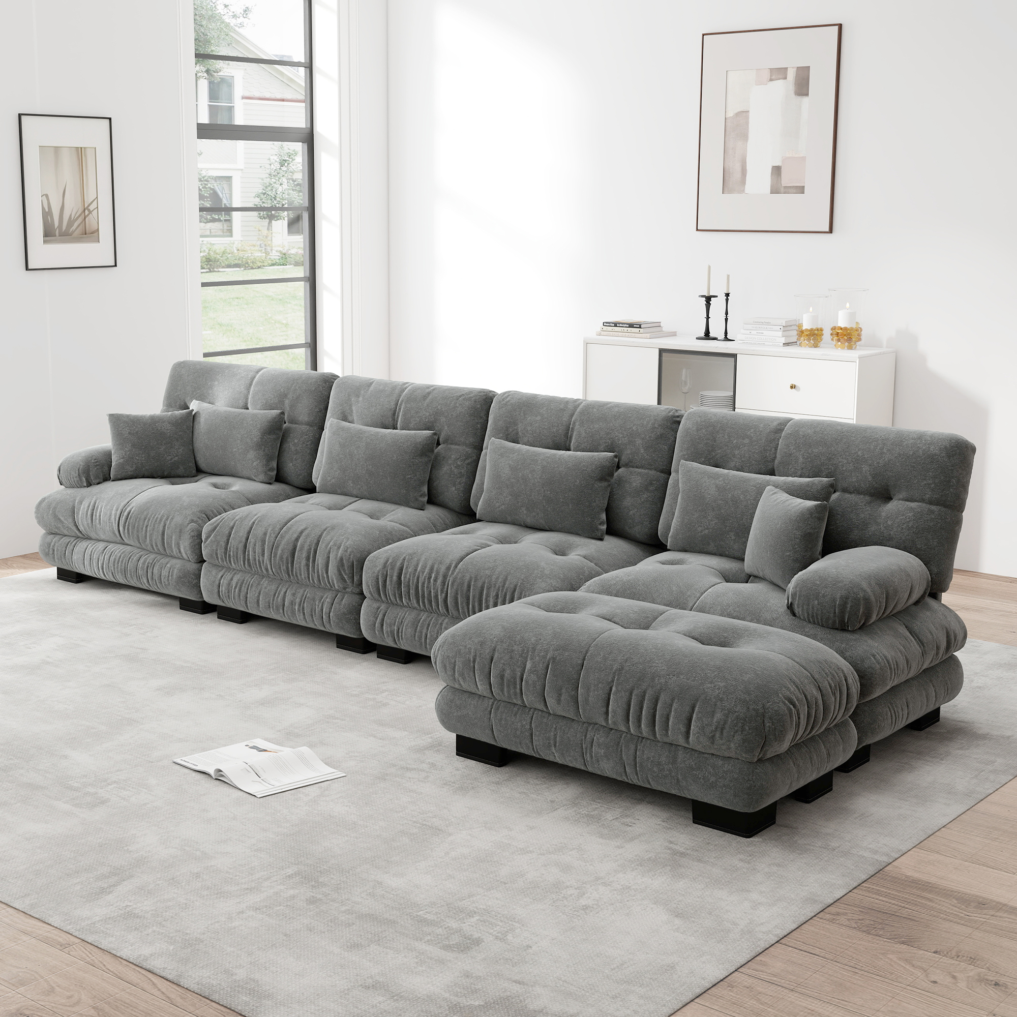 Canapé d'angle 4 places en chenille gris avec accoudoirs ronds rembourrés et coussins inclus