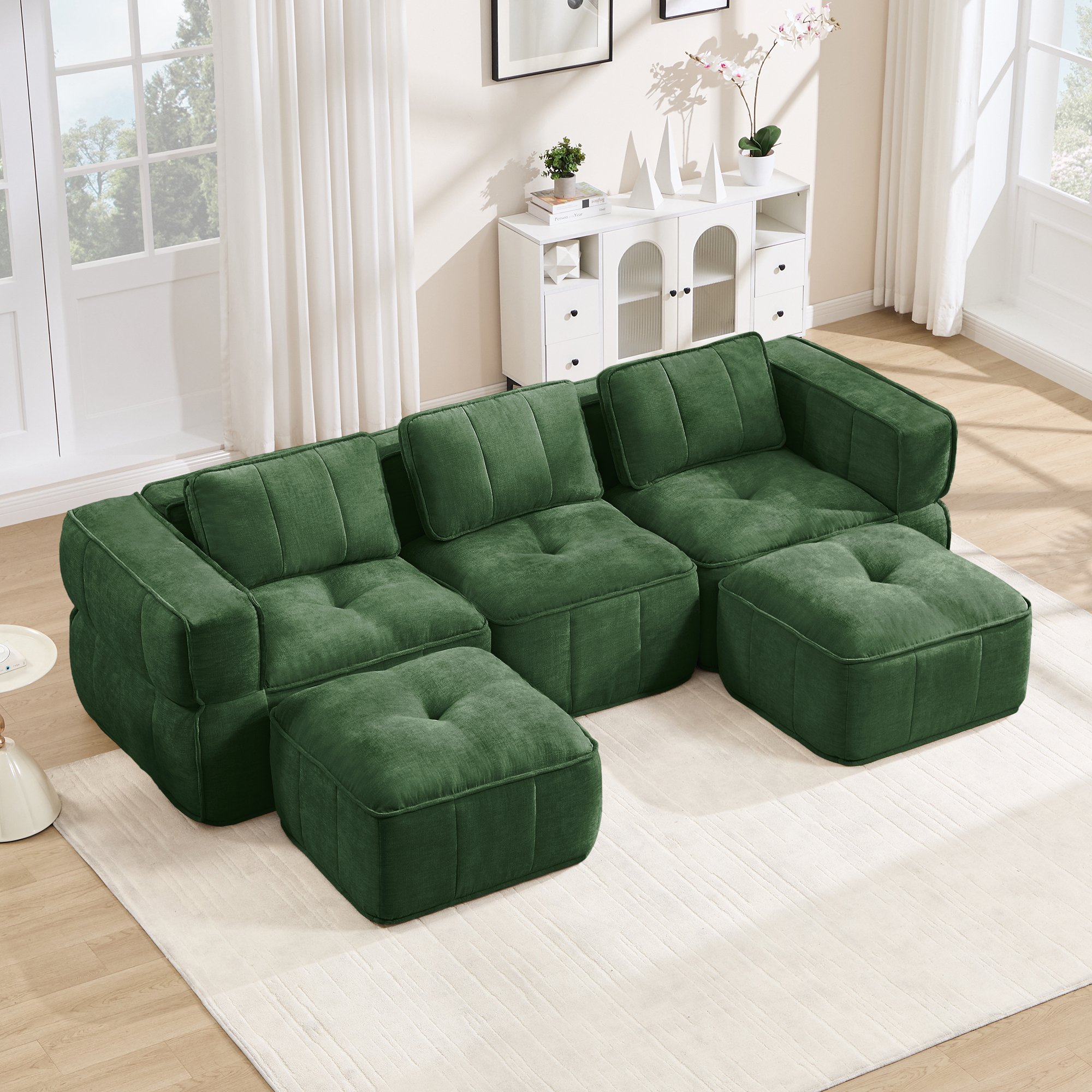 Canapé modulable 3 places vert en polyester, structure sans cadre, mousse haute densité, profondeur assise généreuse, idéal pour le salon moderne et les moments de détente.