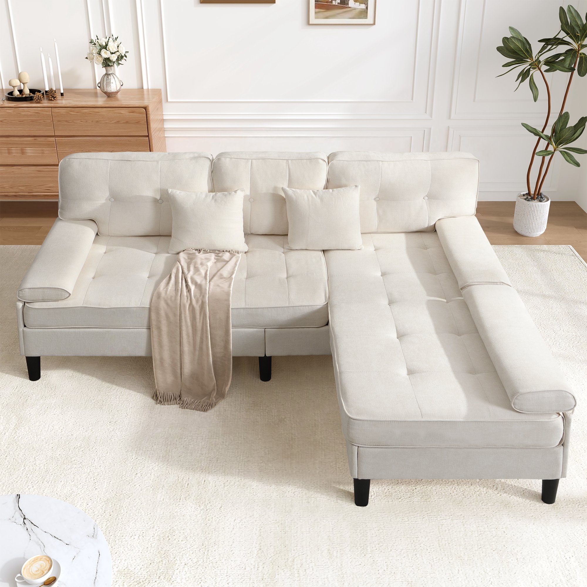 Canapé d'angle convertible 3 places en tissu chenille beige clair avec pouf mobile, structure bois massif et pieds plastiques renforcés pour salon ou studio